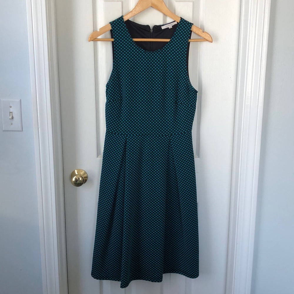 Polka dot pleated sheath dress